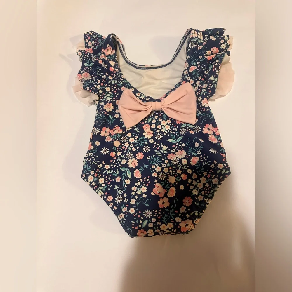 Ruffle Butts Flutter Sleeve Navy Floral Swimsuit